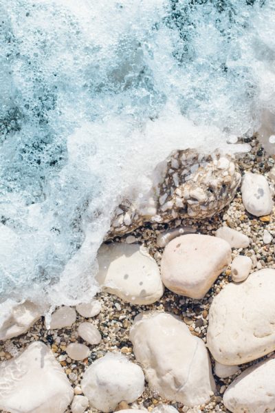 Waves Over Rocks